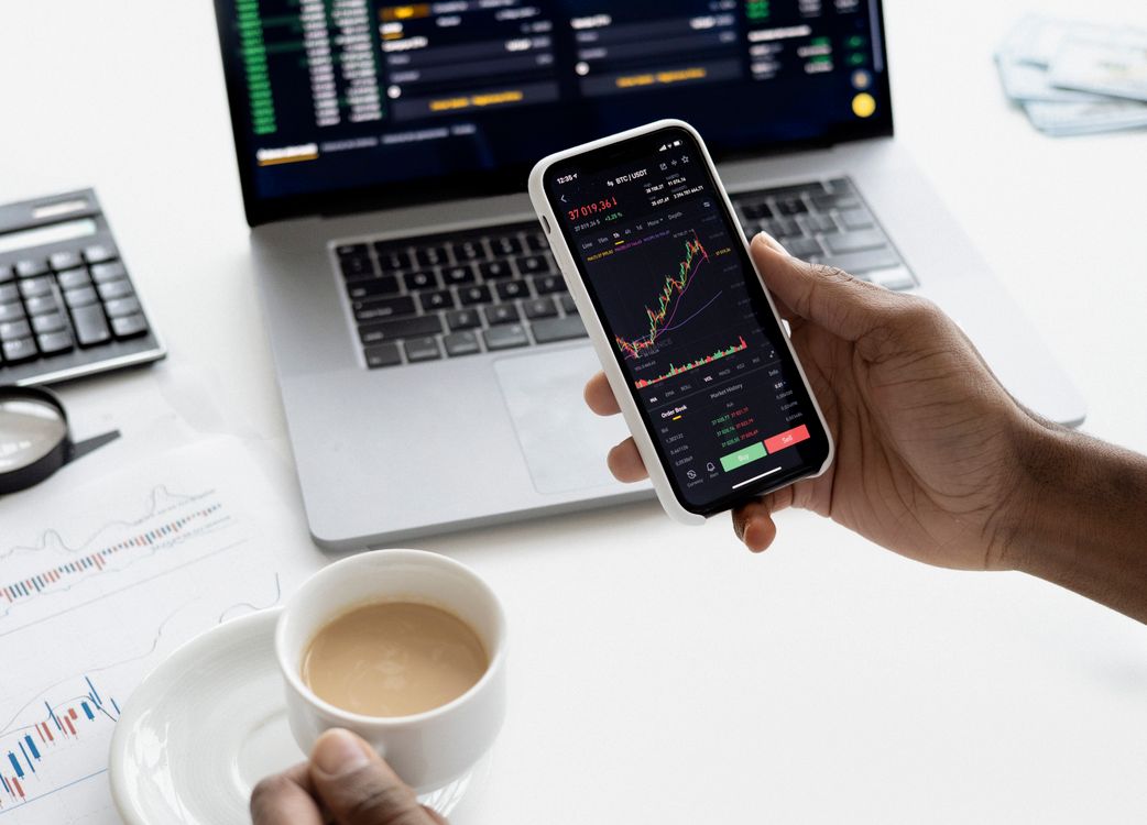 A holiday rental owner reviewing booking costs while commission flows towards an anonymous marketplace